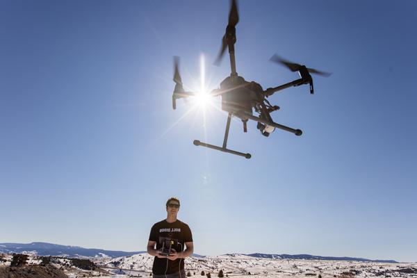 Man flying a drone